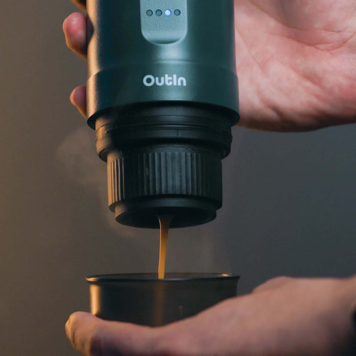 Outin Nano Portable Espresso Machine - Teal being used