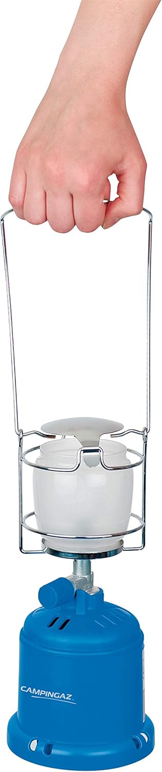 Campingaz 206L Gas Lantern being held, compact and reliable camping light.