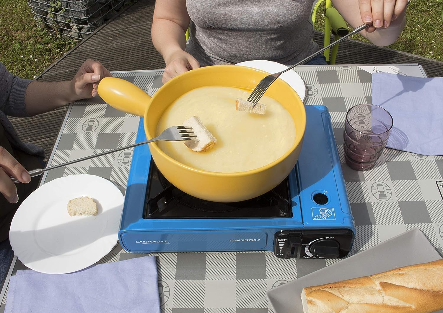 Cooking fondue on the Campingaz Bistro 2 portable camp stove outdoors