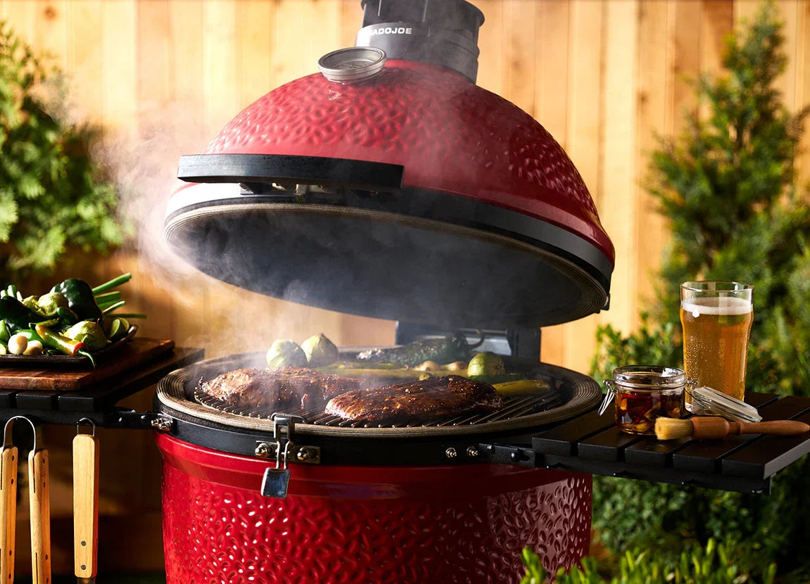 Kamado Joe Classic Joe Grill - Series II used outside for cooking grilling