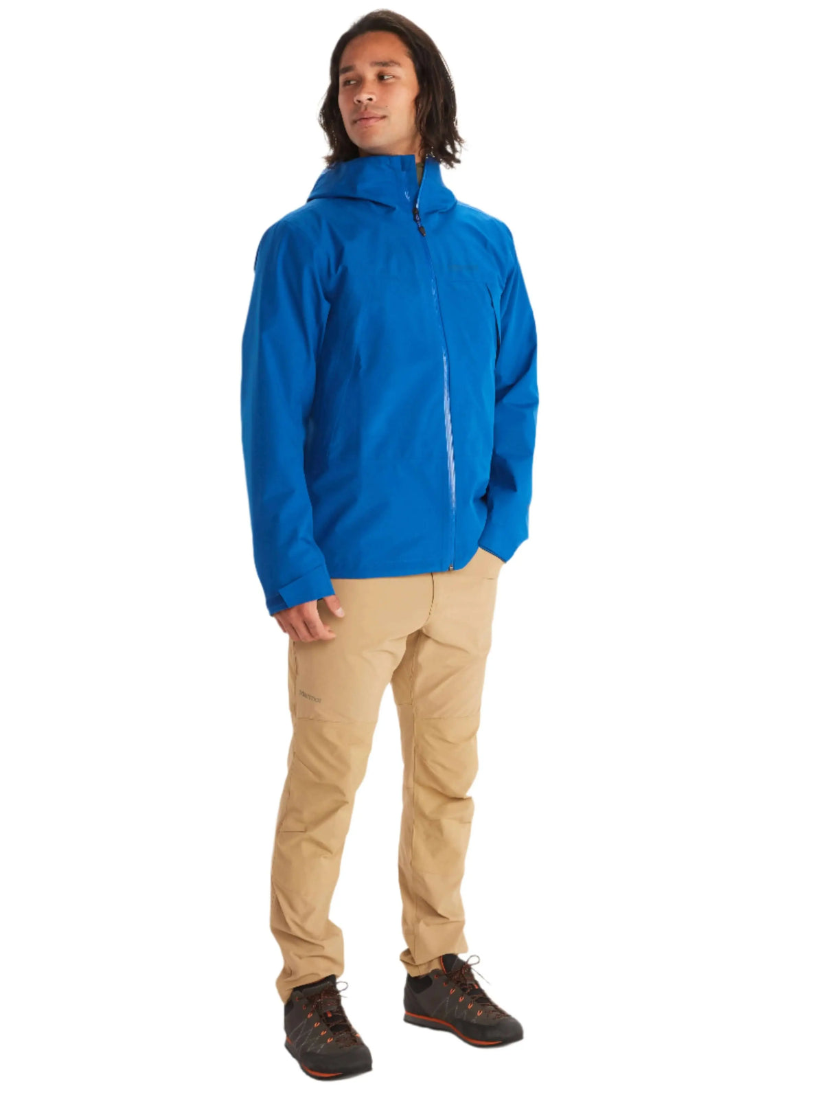 Man wearing Marmot Gore-Tex Minimalist Pro Jacket in blue for wet and windy conditions.