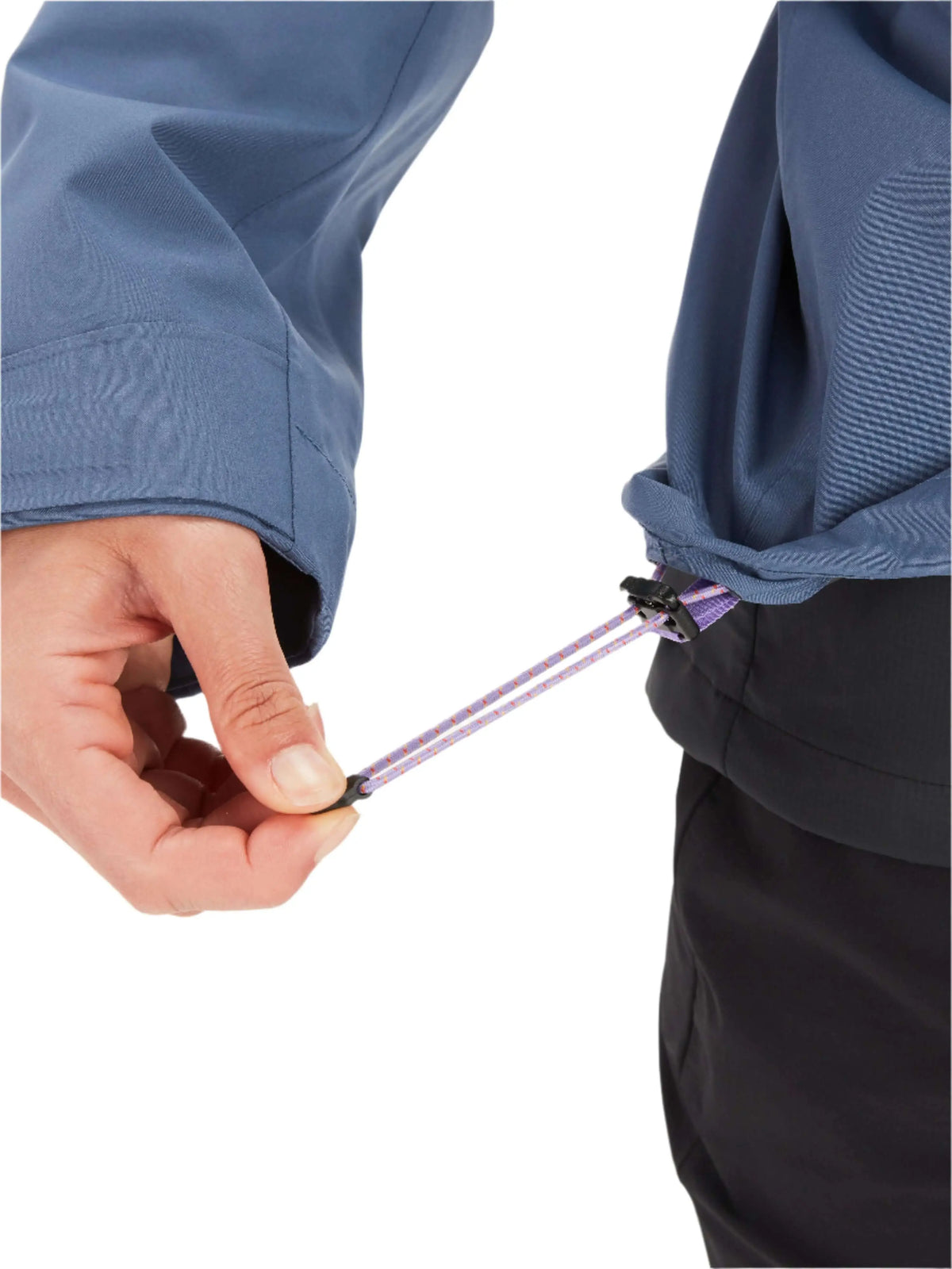 Adjusting hem drawstring on Marmot Gore-Tex Minimalist Pro Jacket - Women for secure fit.