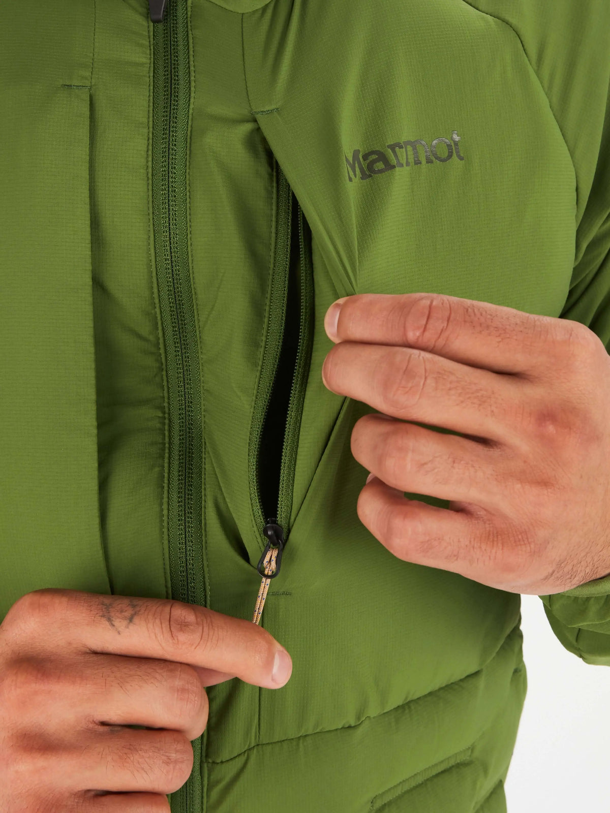 Marmot Warmcube men's winter jacket in green showcasing front zipper detail