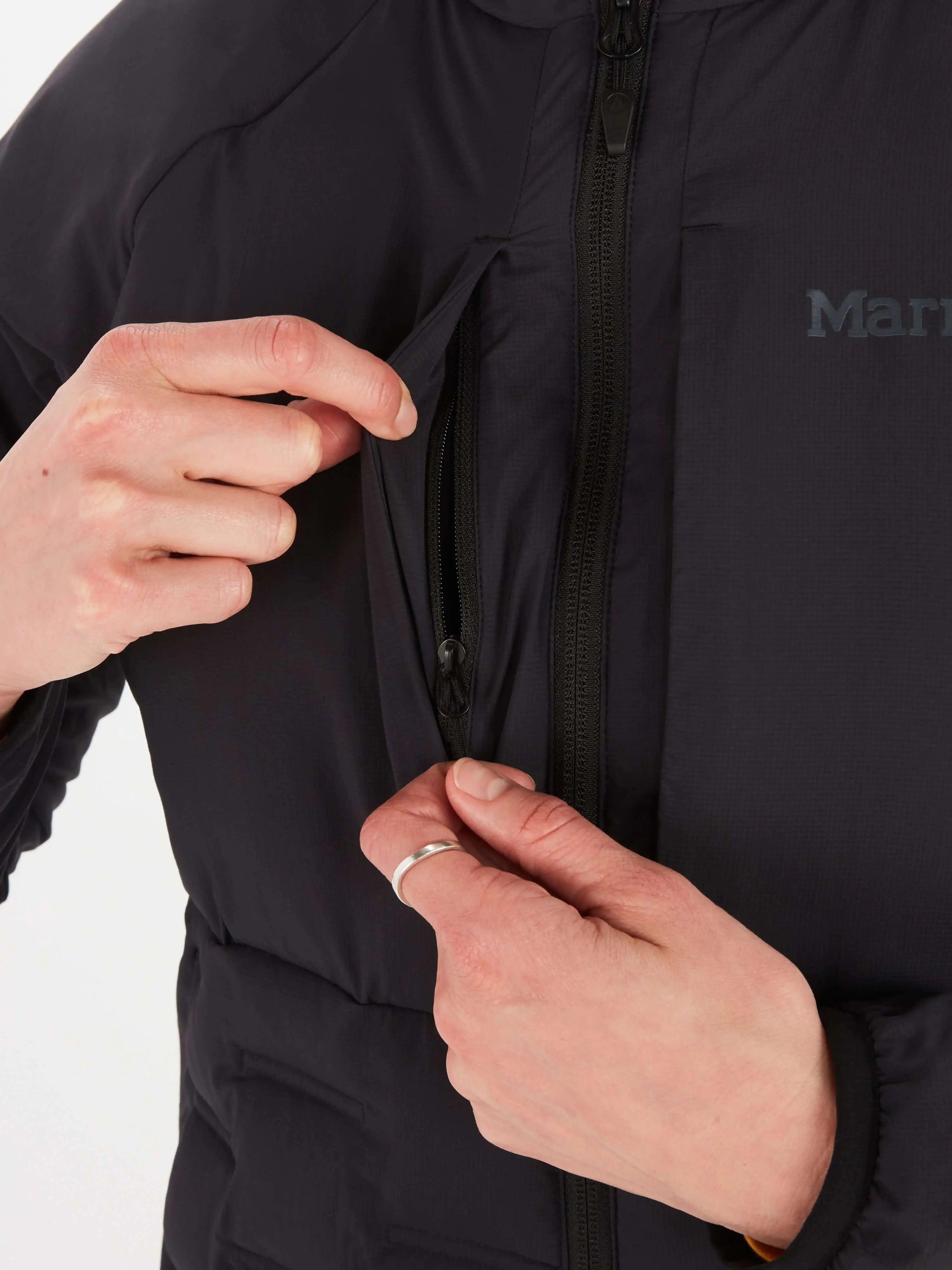 Close-up of Marmot Warmcube Women's Active HB Jacket showing pocket detail and zipper.