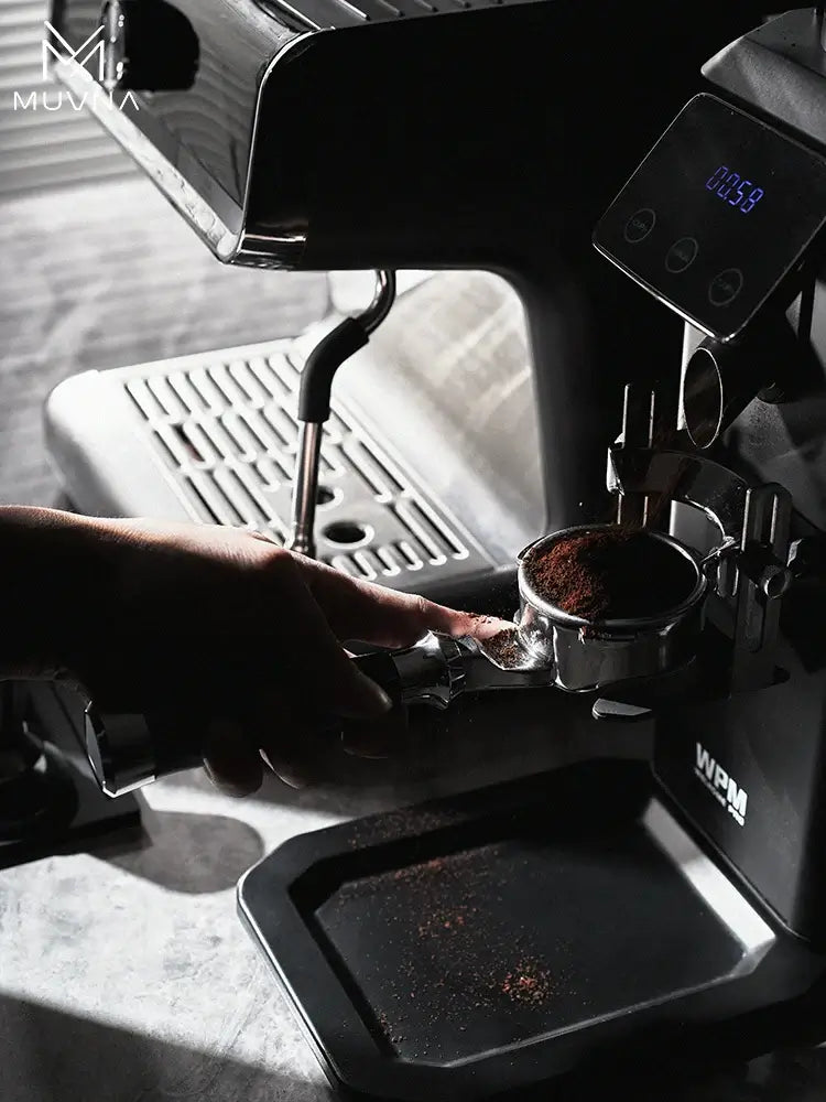 Muvna Lucifer Bottomless Portafilter brewing espresso at a UAE campsite