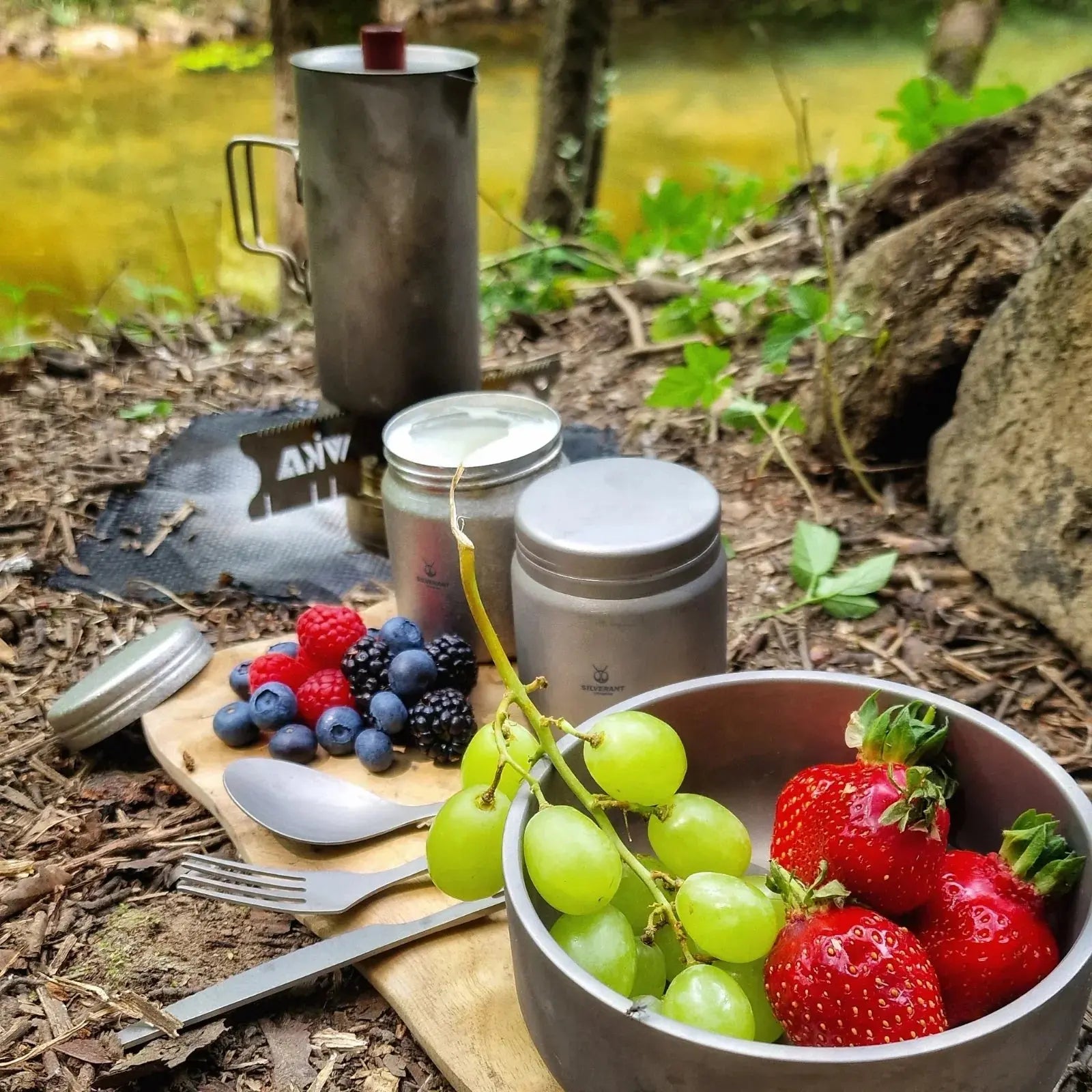 SilverAnt Ultralight Titanium Coffee French Press folded inside its drawstring mesh bag.