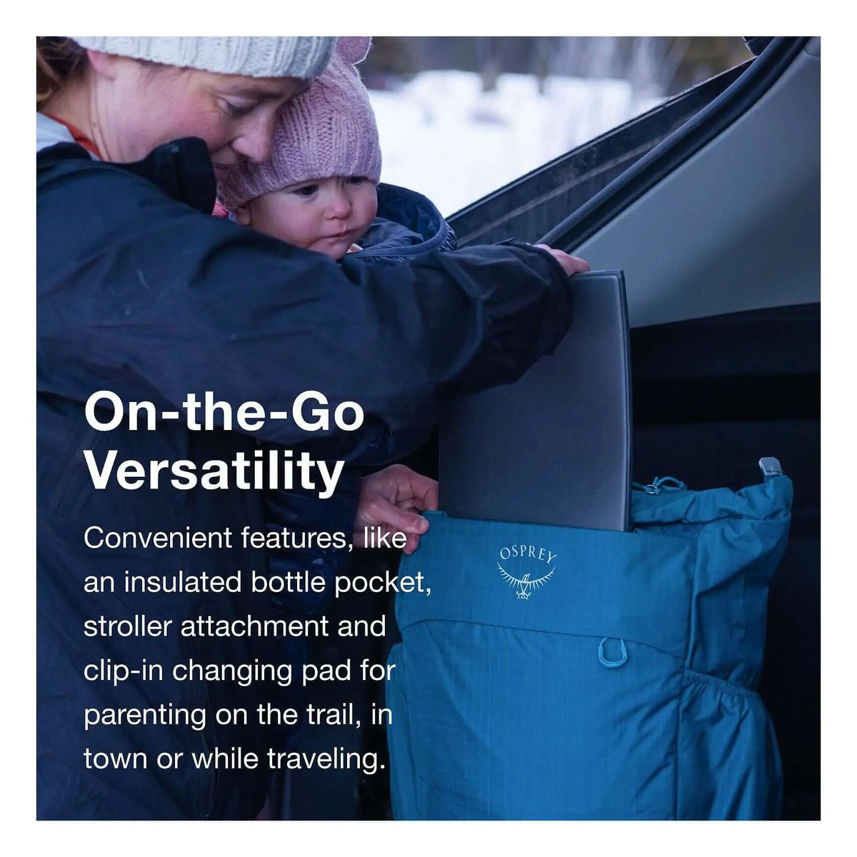 Mother using Poco Changing Tote by Osprey with a child, showcasing on-the-go convenience with a removable changing mat.