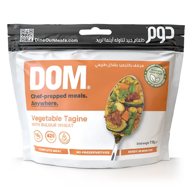Dine Out Meals Vegetable Tagine with Bulgur Wheat packaging, a Moroccan-inspired dish with chickpeas, zucchini, and more, ready to eat.