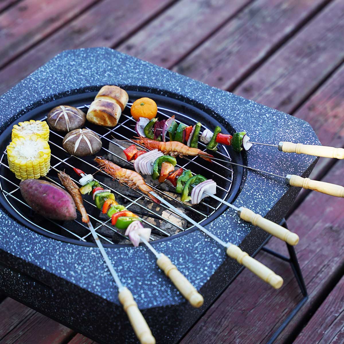 MGO Square Fire Pit burning logs safely at a desert campsite