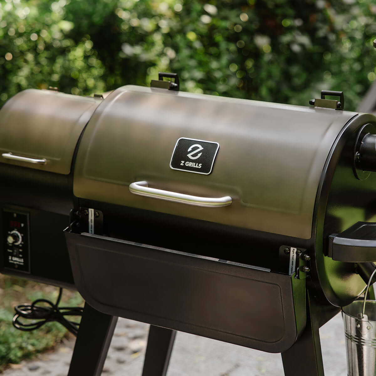 Z Grills Wood Pellet Grill and Smoker 450A in a sunny outdoor setting, ideal for authentic wood-fired flavor and outdoor gatherings.