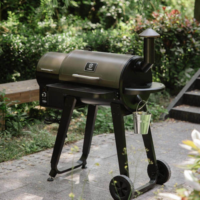 Z Grills Wood Pellet Grill and Smoker 450A in a garden setting, showcasing its high-performance design for authentic wood-fired flavor