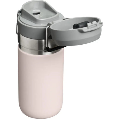 Stanley Go Quick Flip Water Bottle - 16 oz in a light pink color with open lid showcasing its rugged design.