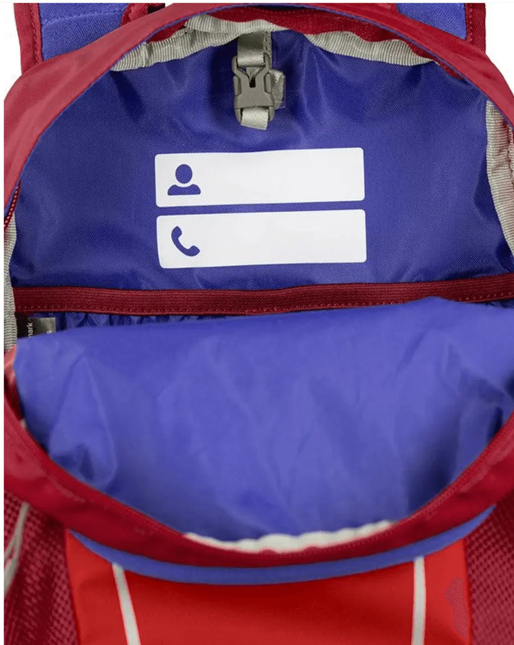 Osprey Daylite Jr. - Kids backpack interior with built-in name tag, showcasing durability and functionality for children.