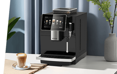 Jetinno JL09 automatic espresso coffee machine on a kitchen counter with a cappuccino ready beside it.