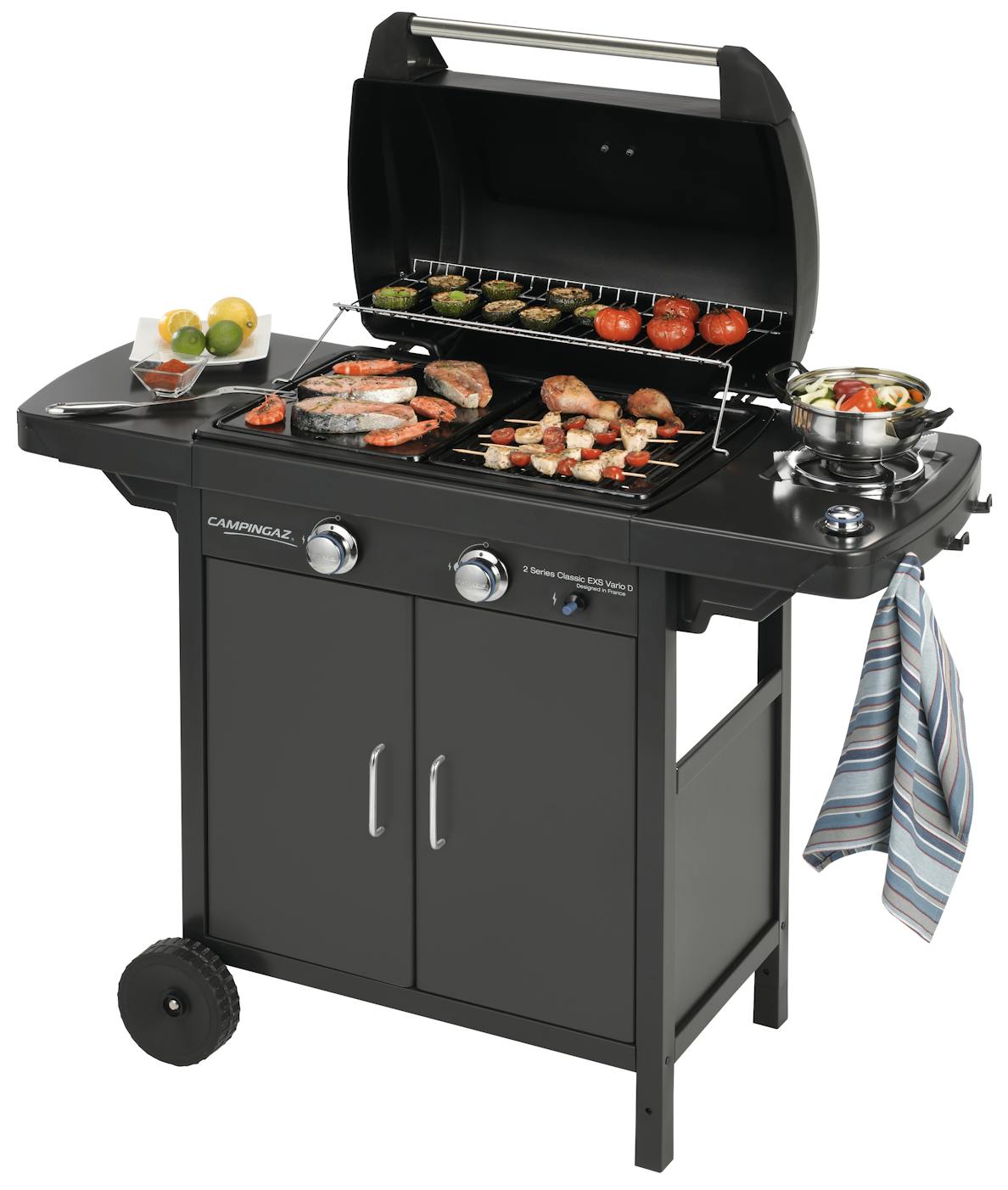 Campingaz 2 Series EXS Vario D Gas Grill with food, featuring a sleek design for outdoor cooking.