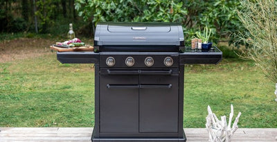 Campingaz 4 Series Onyx S Outdoor Gas BBQ Grill in a garden setting