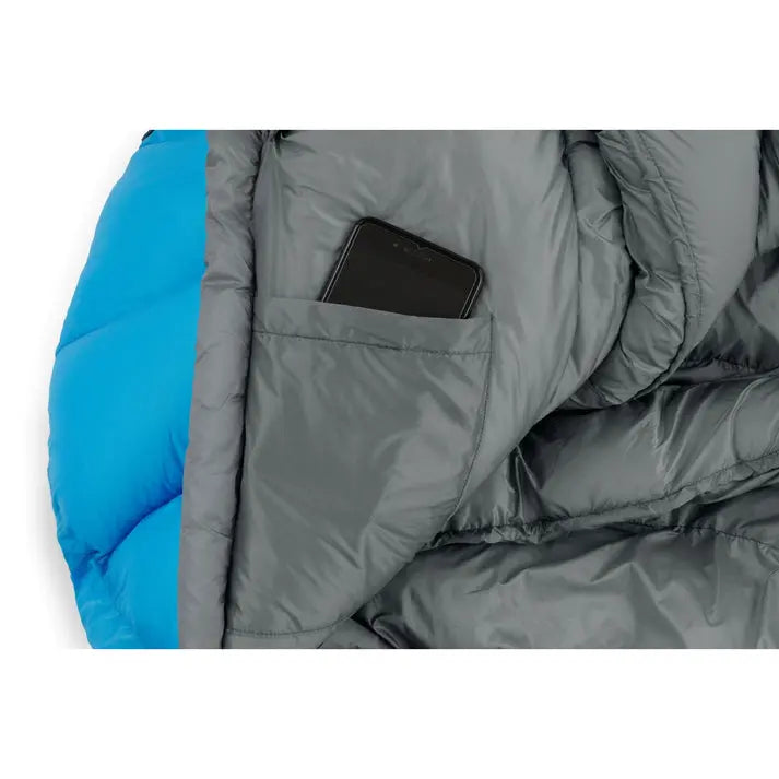 Close-up of Core Equipment 30 Degree Mummy Sleeping Bag with pocket holding a smartphone, showcasing high performance material.