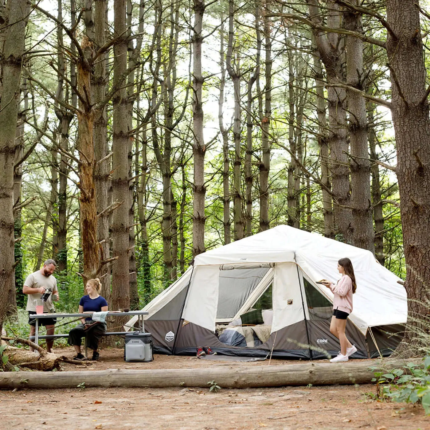 10 Person Lighted Instant Pyramid Tent - 16' x 9' set up in forest with people enjoying camping.