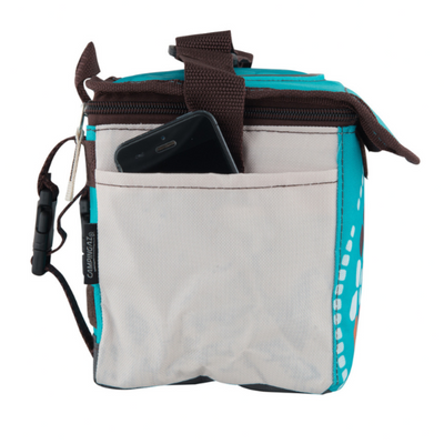 Campingaz Ethnic MiniMaxi 4L Soft Cooler Bag with front pocket and a phone inserted, ideal for outdoor use.