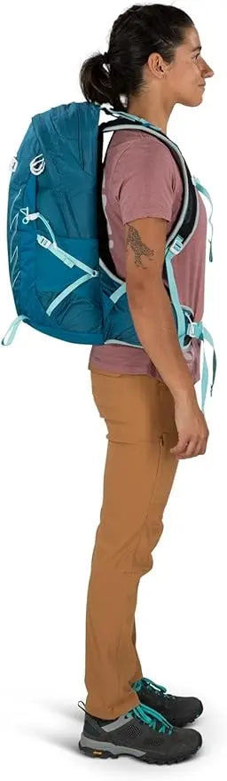 Person wearing Osprey Talon Earth 22 men's hiking daypack side view