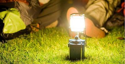 Campingaz 206L Gas Lantern illuminating campsite grass during outdoor adventure