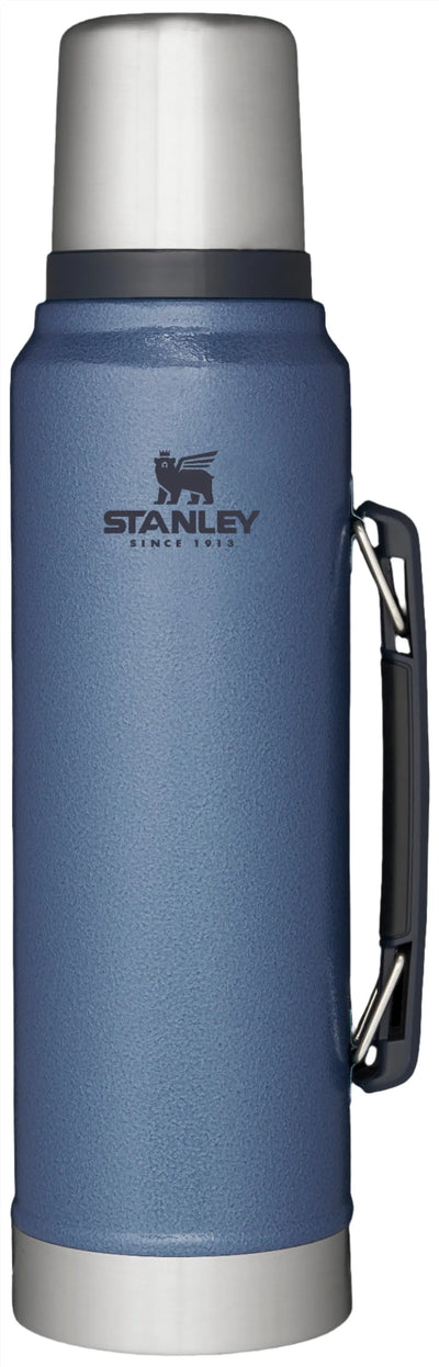 Stanley Classic Legendary Bottle Vacuum Flask 34 oz shown in blue with sturdy handle and classic design.