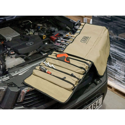 ARB Tool Roll Bag — packed tool kit rolled tight for compact cargo storage.