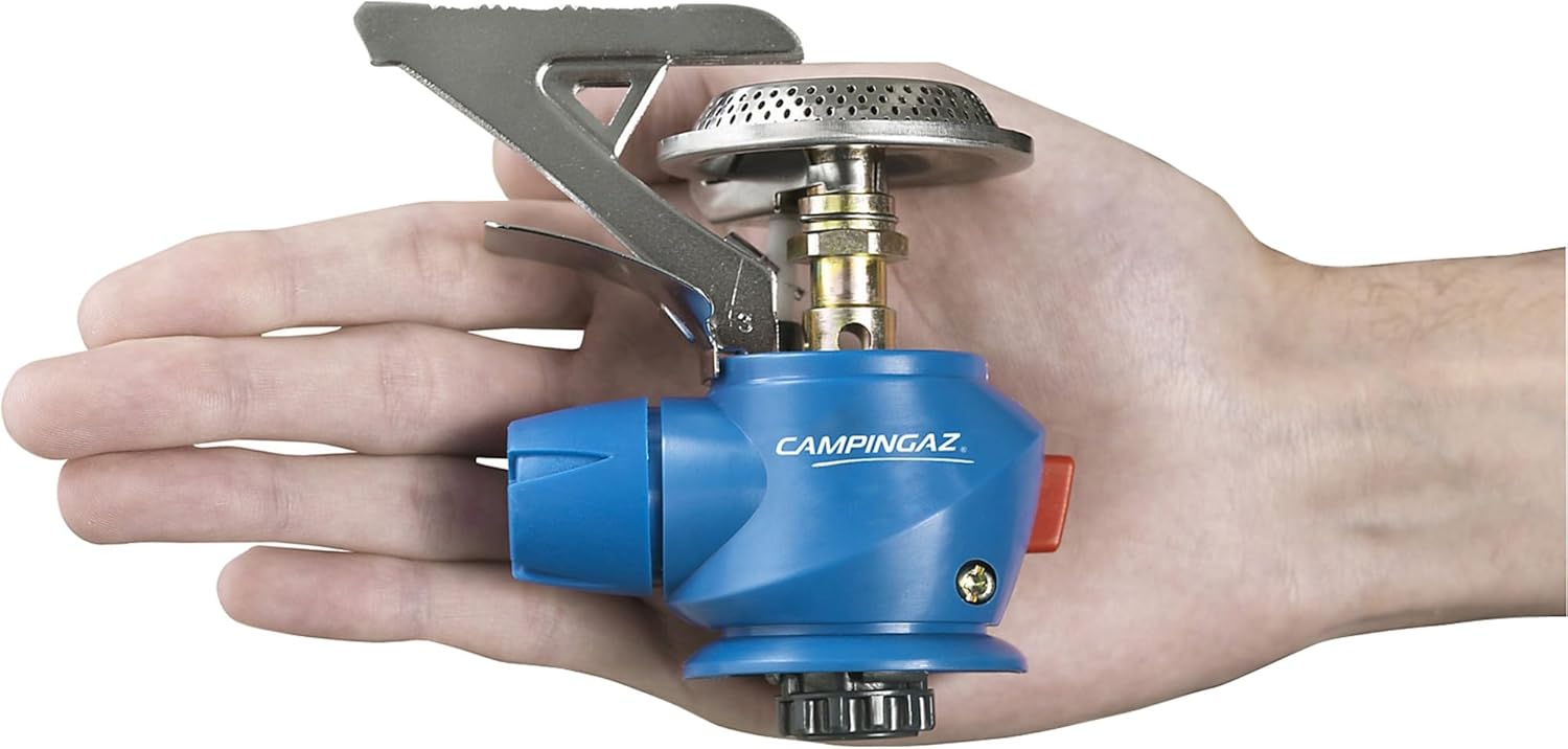 Compact Campingaz Twister Plus PZ Stove held in hand, ideal for UAE outdoor cooking adventures