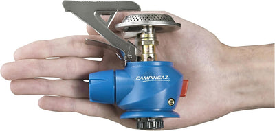 Compact Campingaz Twister Plus PZ Stove held in hand, ideal for UAE outdoor cooking adventures