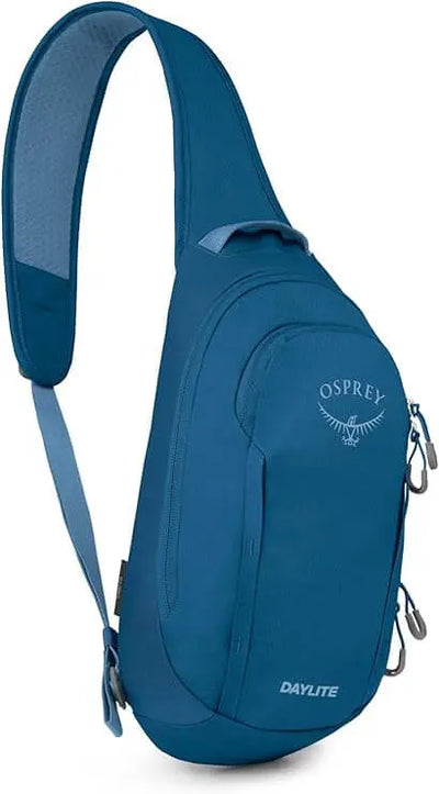 Osprey Daylite Sling bag in blue with cell phone sleeve and daisy chain details for ambidextrous carry.