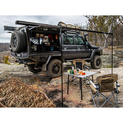 Aluminium Awning with LED Light Kit - 2m x 2.5m installed on a 4x4 vehicle in a rugged outdoor setting