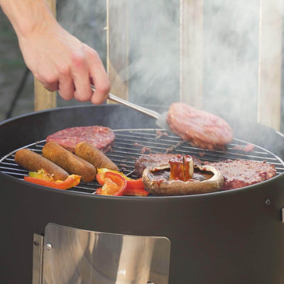 Realcook 17-Inch BBQ Vertical Steel Charcoal Smoker fully assembled in a backyard setting
