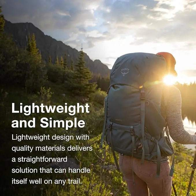Female hiker wearing the Osprey Renn 50L - Women on a mountain trail