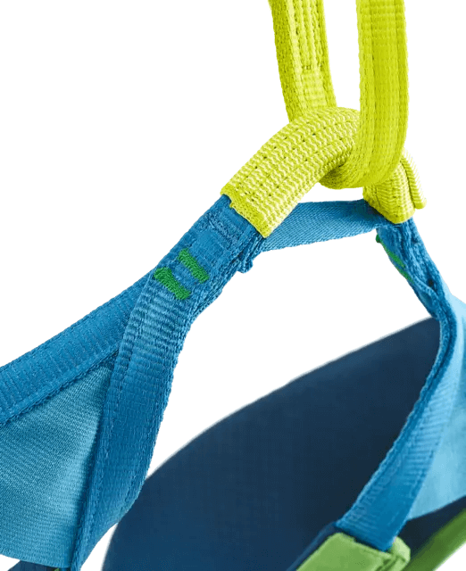 Close-up of Edelrid Jay sit harness showing blue and yellow straps, designed for versatile climbing adventures.