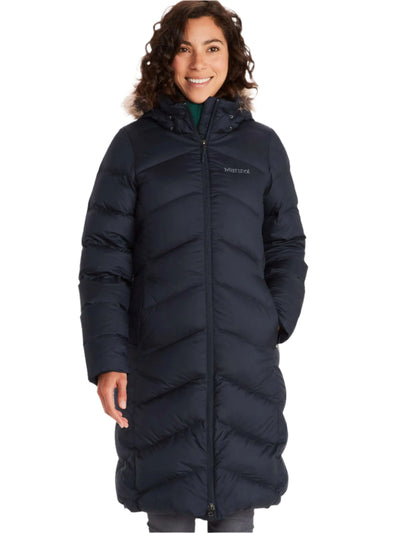 Woman wearing Marmot Montreaux Coat in cold weather conditions