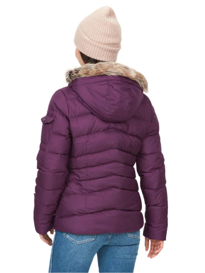 Back view of woman wearing purple Marmot Ithaca Jacket with hood and fur trim.