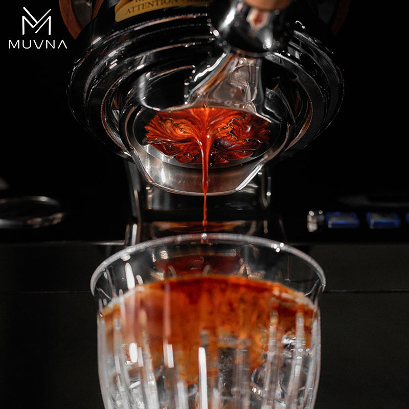 Espresso flowing through Muvna Lucifer Bottomless Portafilter, highlighting the 58mm black resin design, perfect for coffee enthusiasts.