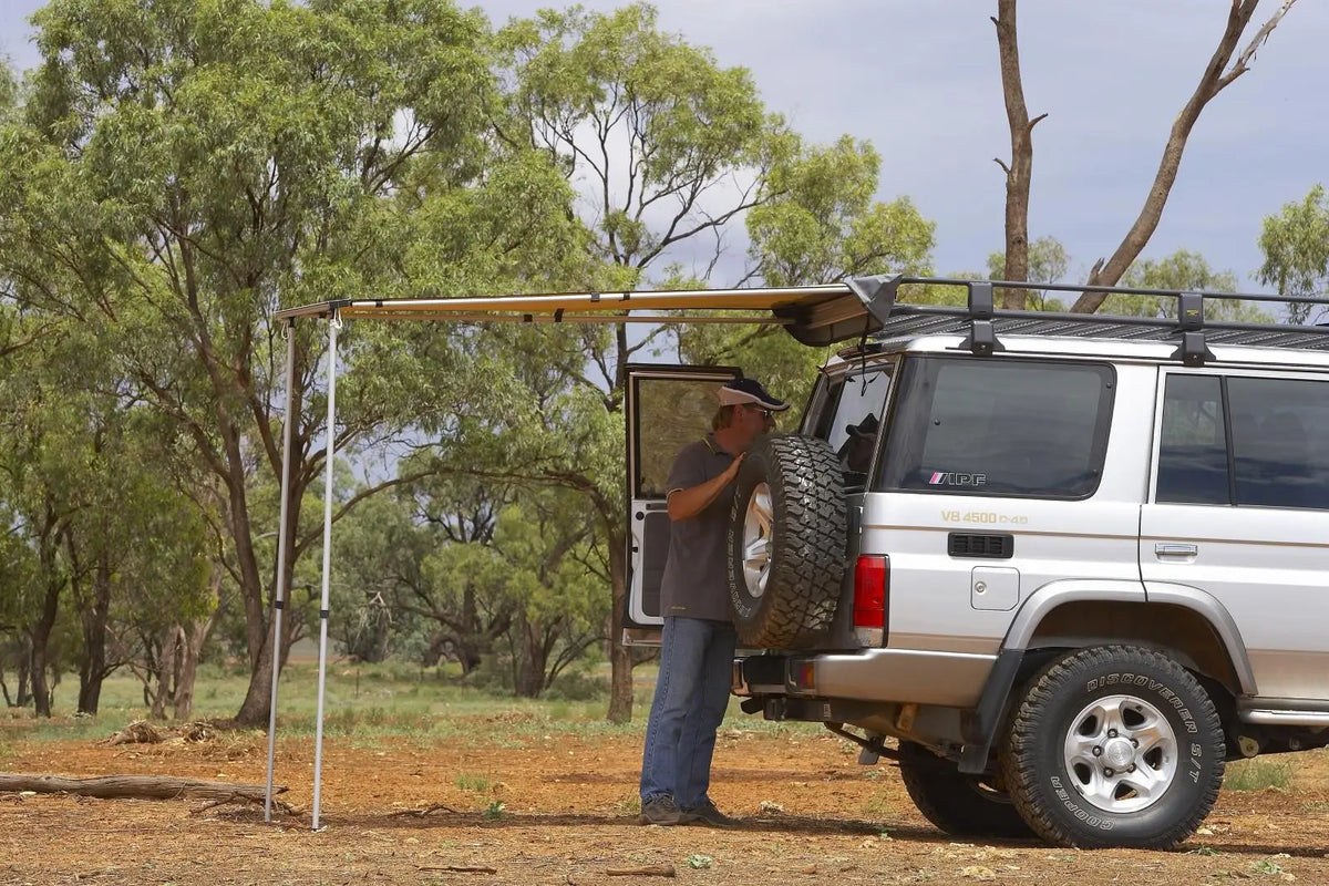ARB Awning 1.25m x 2.10m Retractable Camping Side Shade 1250mm x 2100mm mounted on vehicle side opened