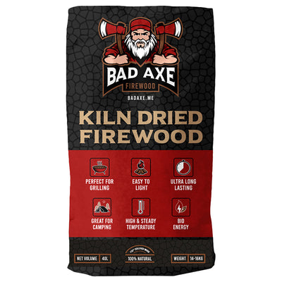 Bad Axe Olive Firewood — stacked olive hardwood logs, front view.
