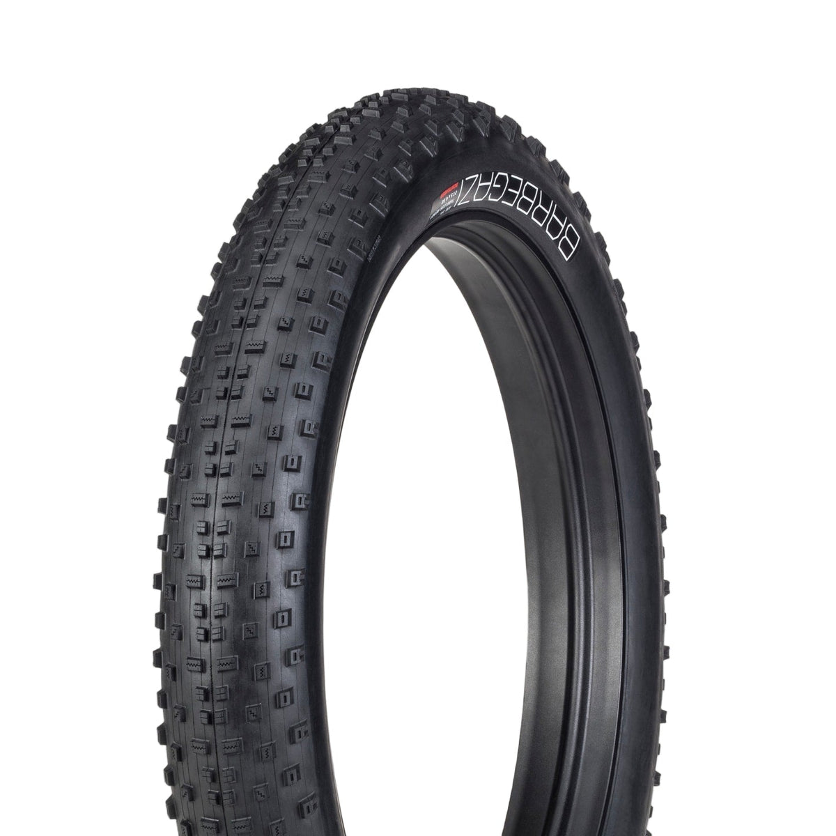Black tire with tread pattern on a white background