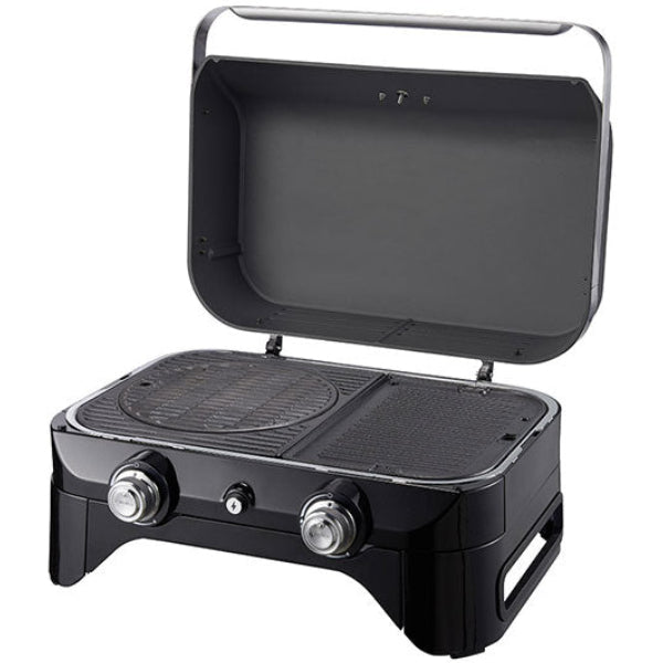 Campingaz Attitude 2100 LX portable gas grill with open lid, showcasing two burners and compact design for versatile outdoor cooking.