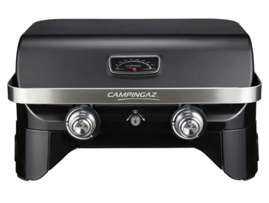 Front view of Campingaz Attitude 2100 LX Portable Gas Grill, ideal for outdoor cooking and barbecue on balconies.