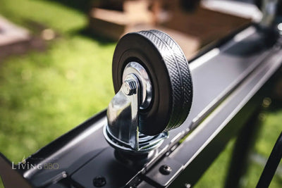 Close-up of a wheel on a Campingaz 4 Series Onyx S Outdoor Gas BBQ Grill, highlighting mobility and design.