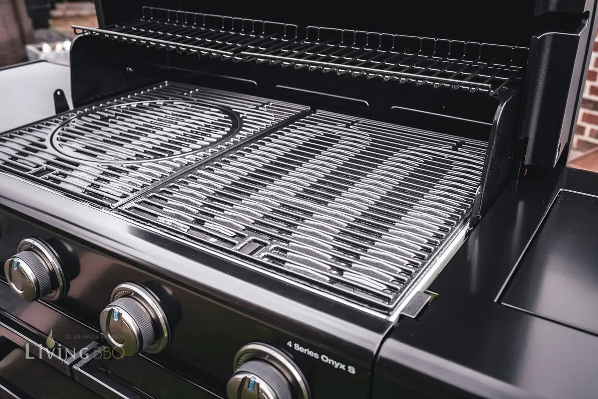 Close-up of Campingaz 4 Series Onyx S Outdoor Gas BBQ Grill with open lid highlighting the cooking grates.