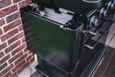 Side view of Campingaz 4 Series Onyx S Outdoor Gas BBQ Grill with stainless steel details and controls
