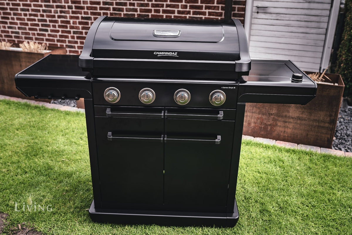 Campingaz 4 Series Onyx S Outdoor Gas BBQ Grill in a backyard setting