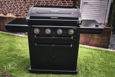Campingaz 4 Series Onyx S Outdoor Gas BBQ Grill in a backyard setting