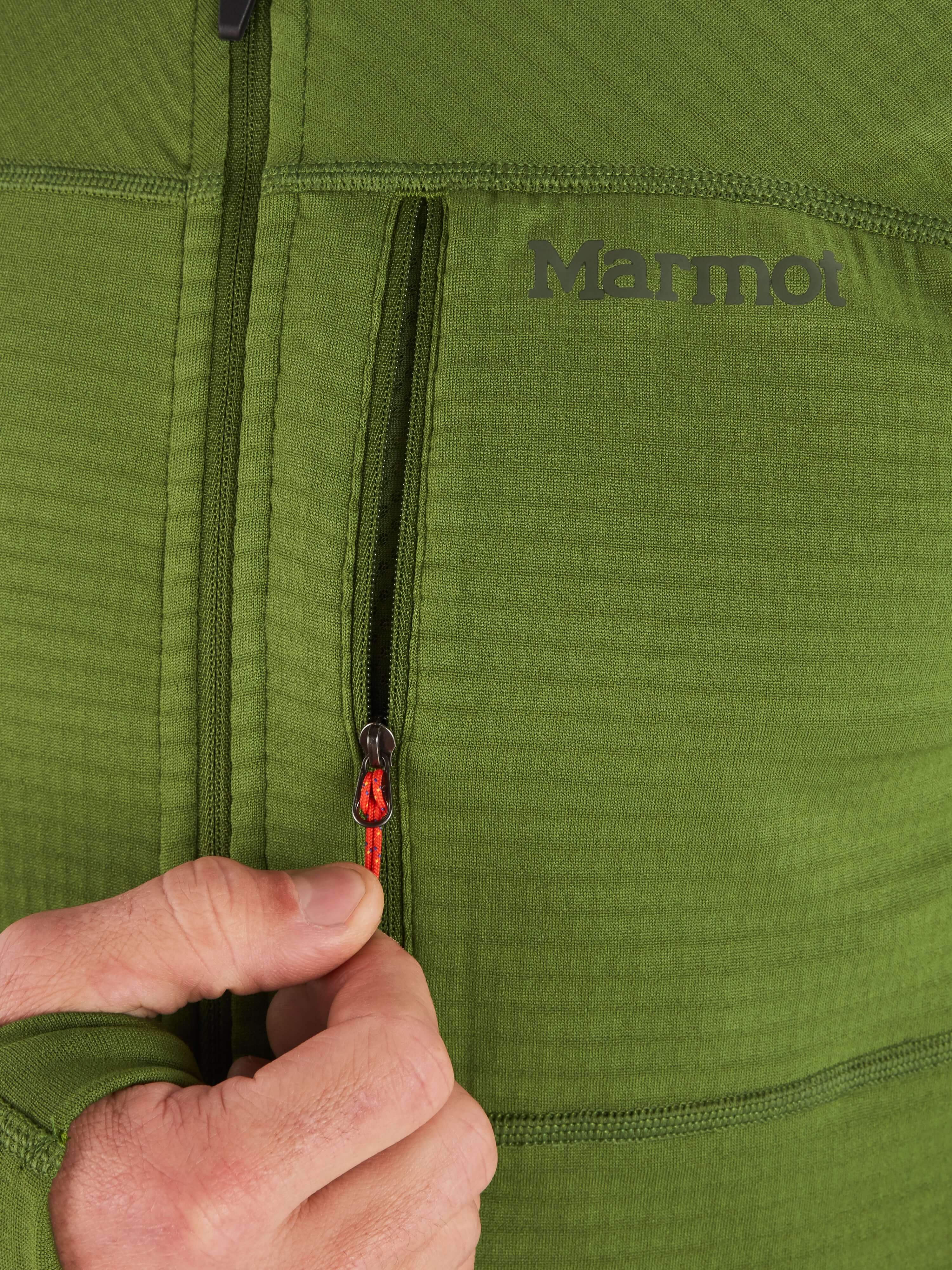 Close-up of green Marmot Preon Jacket showing a zippered pocket detail, ideal for men's hiking and alpine adventures.