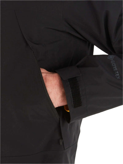 Close-up of the cuff detail on the Marmot Gore-Tex Minimalist Pro Jacket - Men's Shell with hand in pocket.