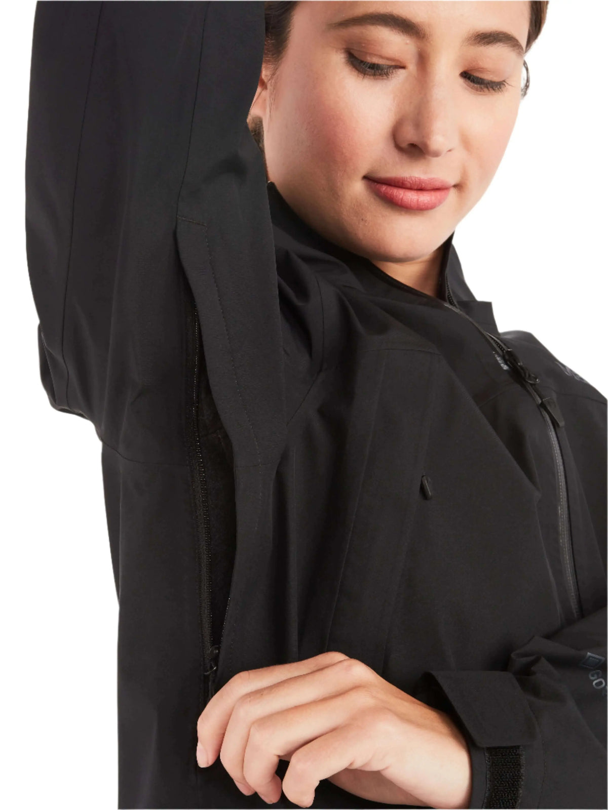 Woman wearing Marmot Gore-Tex Minimalist Pro Jacket showing underarm ventilation zipper feature.